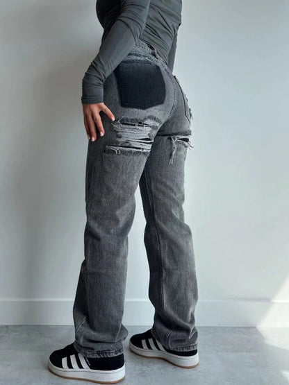 Casual gray ripped jeans with contrast pocket detail, styled with a fitted top and sneakers