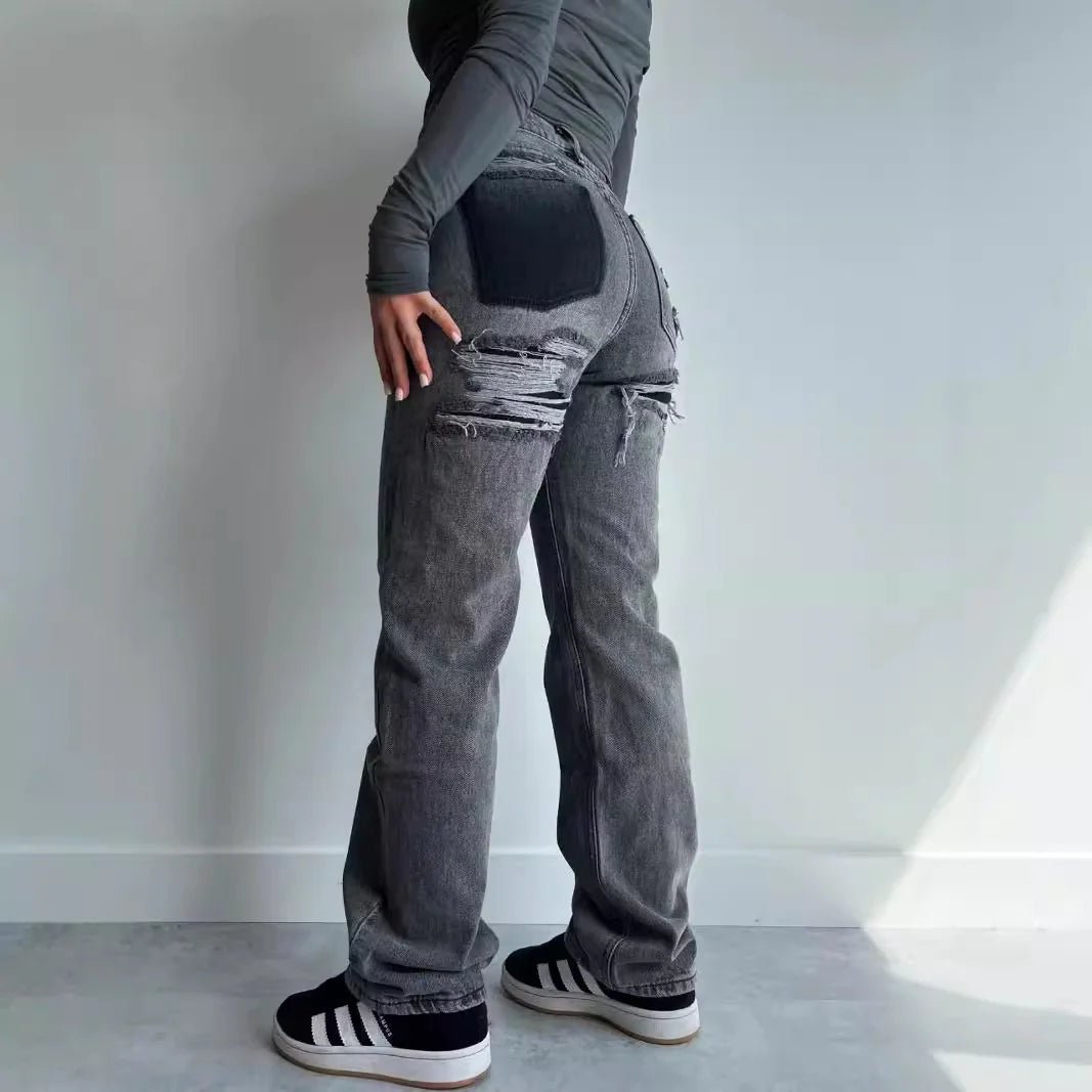 Casual gray ripped jeans with contrast pocket detail, styled with a fitted top and sneakers