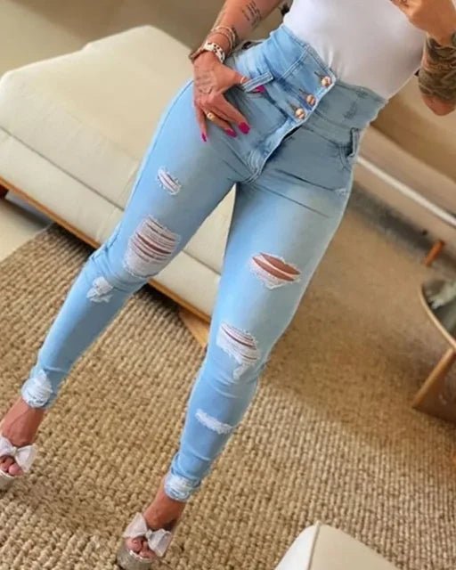 High-rise ripped skinny jeans in light blue with triple-button waistband and frayed details