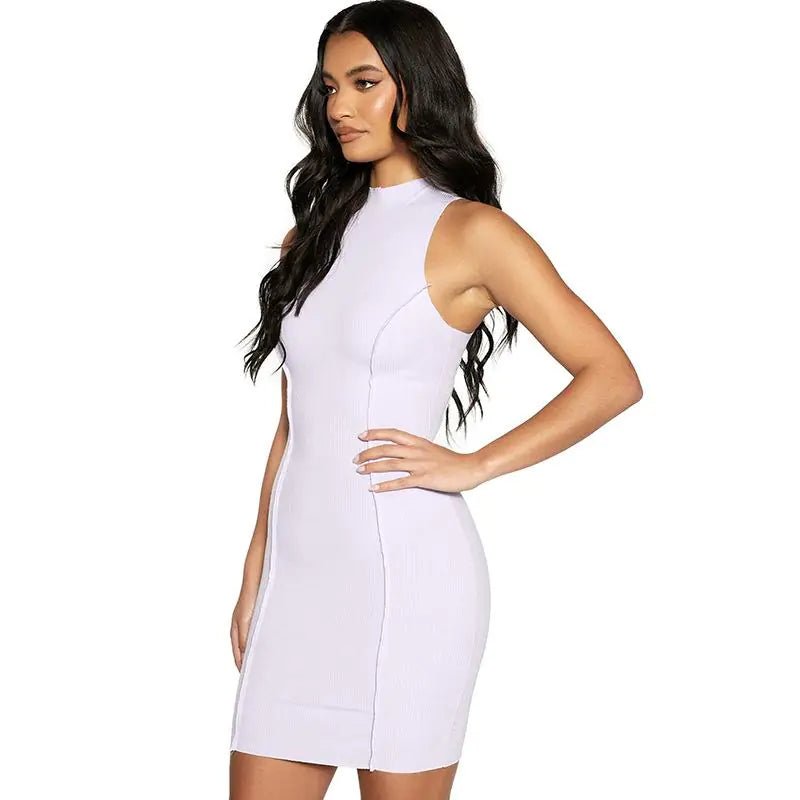 Side view of woman in lilac ribbed halter mini dress with contoured seams and a flattering slim fit.