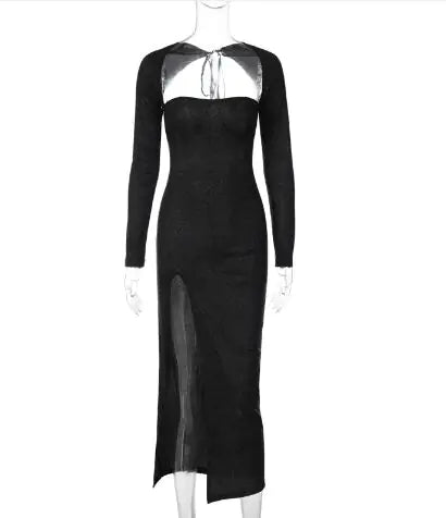 Studio shot of the black slit evening dress on a mannequin showing the full front view and tie detail at the neckline.