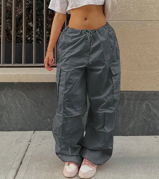 Dark Gray Jogger Pants with Cargo Pockets – High-waisted dark gray cargo jogger pants with drawstring waist and relaxed wide-leg fit