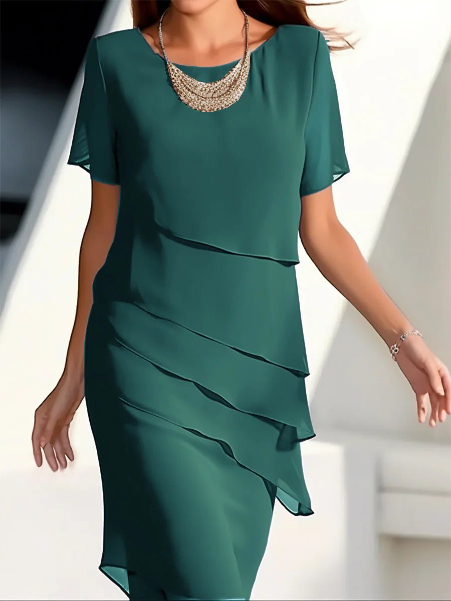 Elegant women's chiffon patchwork dress in green, featuring tiered layers and short sleeves, ideal for spring and summer events.