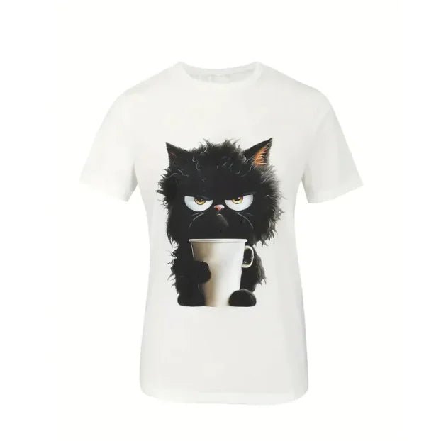 Flat-lay of a white t-shirt with a print of a grumpy black cat holding a coffee cup.