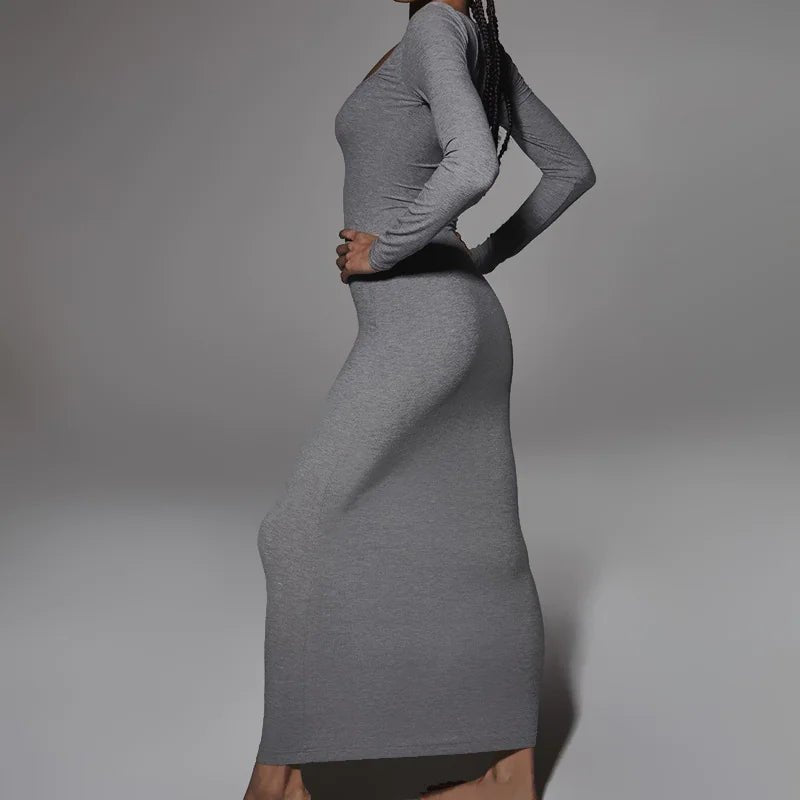 Side view of a gray square neck bodycon dress highlighting the fitted silhouette.