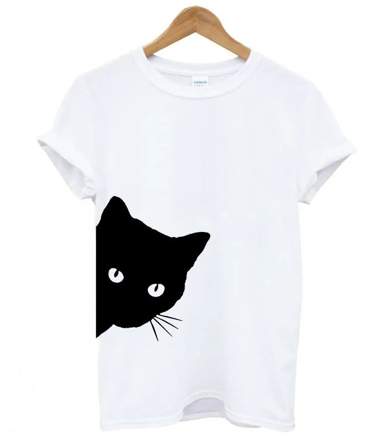 White Cat Tee – White women’s tee with a bold black cat illustration looking out from the side.