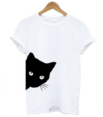 White Cat Tee – White women’s tee with a bold black cat illustration looking out from the side.