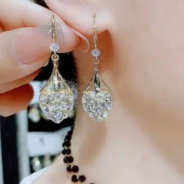 Opal Blossom Tassel Earring Collection - ModaFamilies Opal Blossom Tassel Earring Collection - ModaFamilies | Product Image or Size Chart