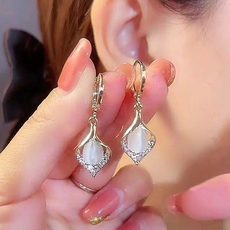 Opal Blossom Tassel Earring Collection - ModaFamilies Opal Blossom Tassel Earring Collection - ModaFamilies | Product Image or Size Chart