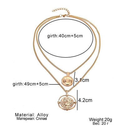 Measurement diagram of a layered vintage coin necklace in gold showing pendant sizes and chain lengths in centimeters.